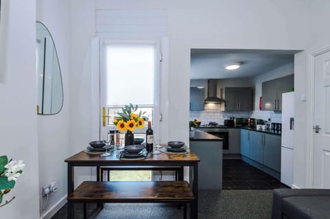 The colourful living room is open plan, allowing you to relax and dine seamlessly. It is equipped with a SMART TV, sofa bed and bench seating for you to enjoy a meal in the evening.