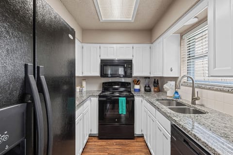 Bright and airy kitchen, ready for your next meal prep!