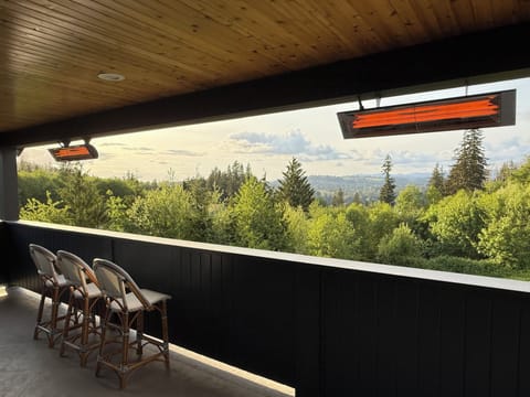 huge covered and heated deck with expansive views above Mayfield Lake