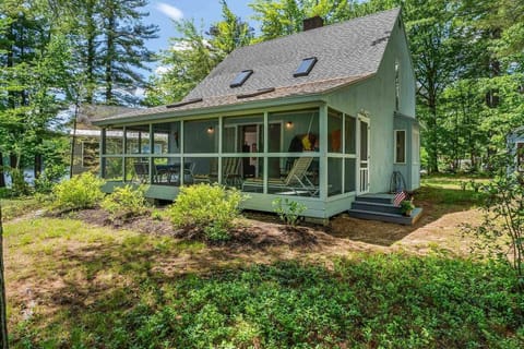 Screened in back porch overlooking the lake.