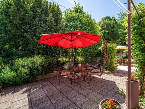 Furniture, Outdoor Furniture, Table, Chair, Outdoor Table, Umbrella, Garden, Kitchen & Dining Room Table, Shade, Flowerpot