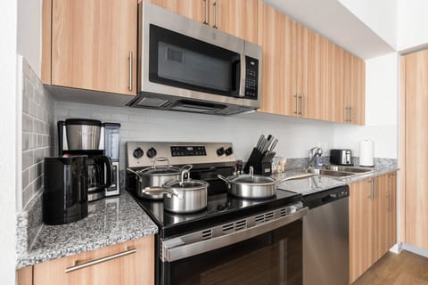 Whip up tasty treats in this modern kitchen with all the essentials.