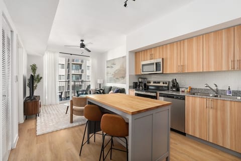 Effortlessly create your favorite dishes in this modern, well-equipped kitchen.