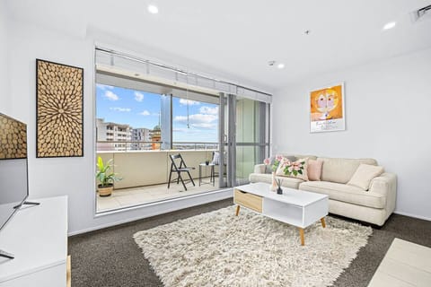 Sit on the couch and watch TV or read a book on the cosy sofa.