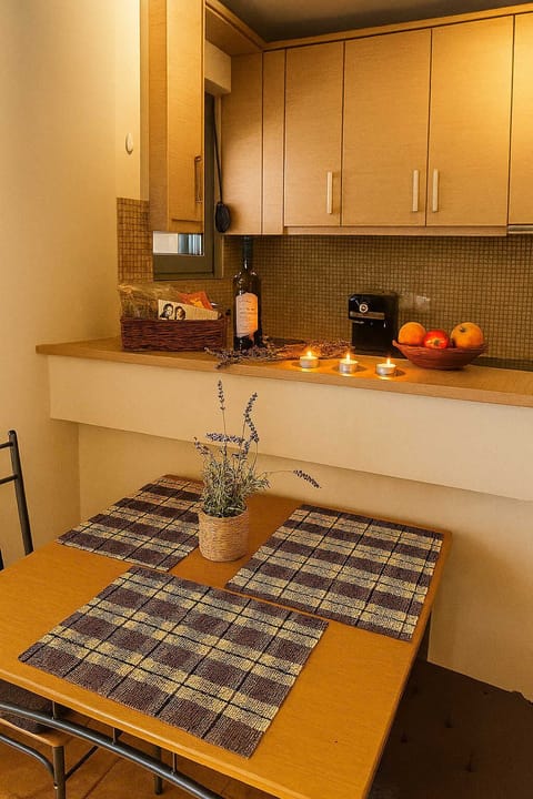 Fully-Equipped Kitchen with Dining Table Setup
