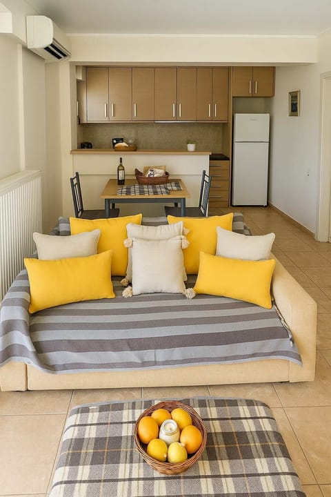 Open-Layout Living Room with Sofa and Storage Cabinets