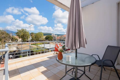 Private Balcony of the Studio with Outdoor Seating and City View