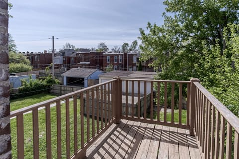 Step out onto your private balcony, located in the shared backyard, to take in the peaceful view of the street while enjoying some fresh air.