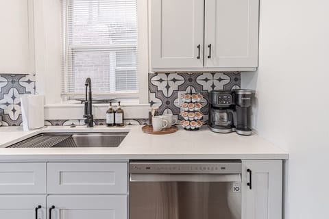 Start your mornings right with our dedicated coffee station featuring a Keurig coffee maker, a variety of coffee essentials you need for a perfect brew.