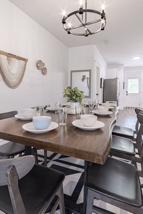 Gather `round an elegantly set table, perfect for memorable meals and lively conversations!