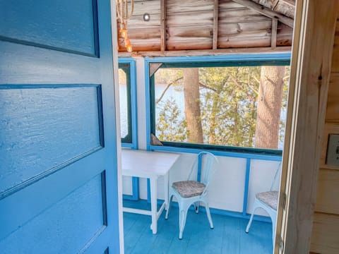 screened porch point of view from inside the cabin