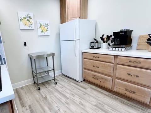 Fully stocked kitchen with full oven. stove, dishwasher, and refrigerator. 