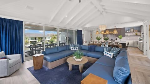 Great Room - Open Floor Plan - Fully Stocked Kitchen - Dining Area - Balcony Access