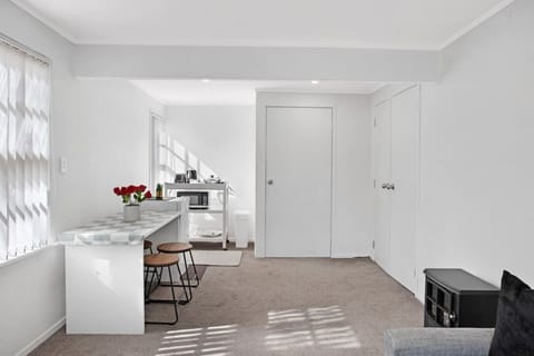 Great view of the open-plan living area with the lounge, dining area and kitchenette in the suite.