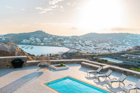 Private terrace with panoramic sea and valley views
Enjoy your morning coffee or evening wine while soaking in breathtaking views of the Aegean and Mykonian countryside from your private terrace.
