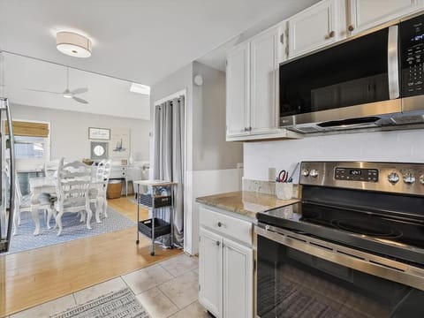 Sleek kitchen featuring ample counter space and modern amenities.