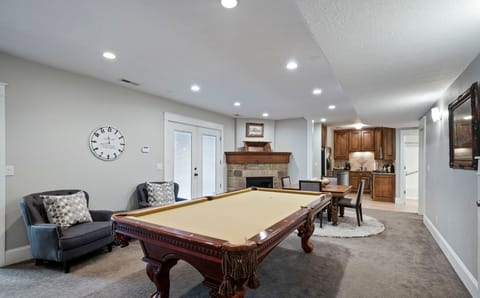 Pool table off of the full kitchen makes for a great gathering place.