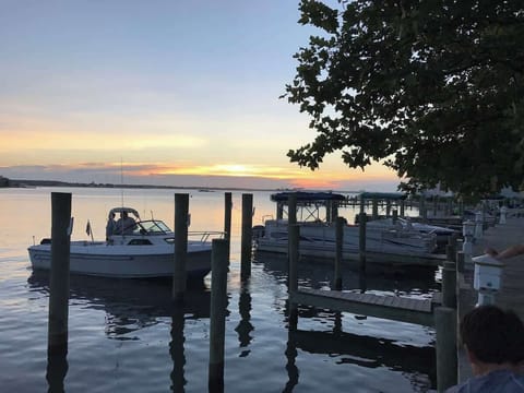 This is one of my favorite sunsets photos on the bay. It was taken from Fishtales restaurant around 30th Street. Great place to take the kiddos where you can watch them unload the days catch!!