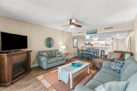 Cozy Living Room with Sleeper Sofa, Flat Screen TV and Private Patio Access