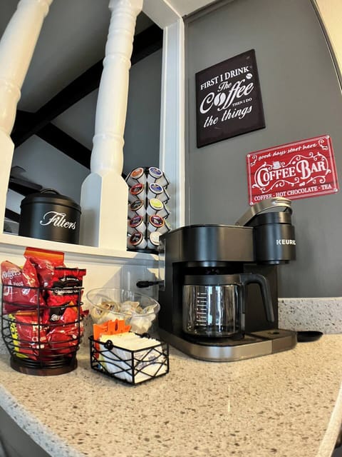 Fully stocked coffee & tea bar, with Keurig singles or full pot feature.