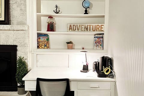 Workspace #1, Wifi Hub with cellular back-up wifi service, universal phone charger, usb hub, and office supplies. Children's and adult coloring books, crayons & colored pencils also provided!