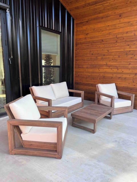Breathtaking patio with comfy seating to enjoy the nature and your morning coffee.