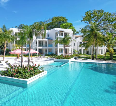 Brand new beautiful beach front condo steps from the sand