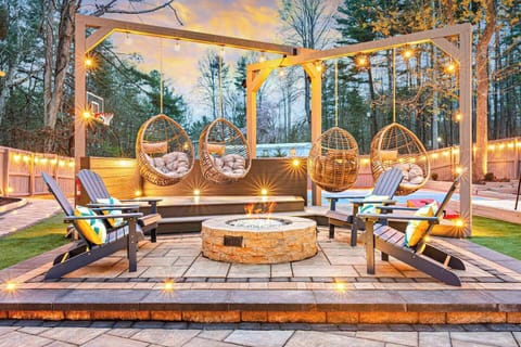 Gather under the stars around a gorgeous gas firepit, surrounded by cozy swing egg chairs. It's the perfect spot for evening conversations, roasting marshmallows, or simply unwinding in style and comfort.
