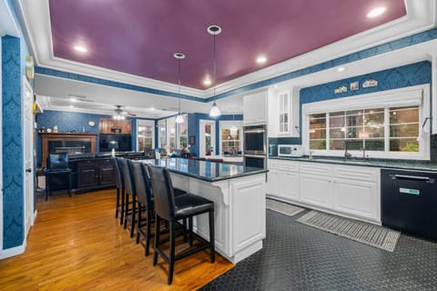 Host with ease in this open-concept kitchen that flows beautifully into the living and dining areas.