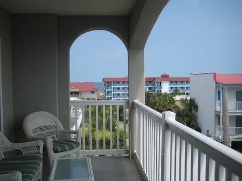 glimpses of the ocean from your covered balcony