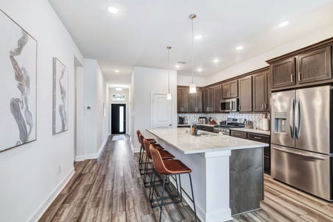 Our kitchen includes stainless steel stove, oven, microwave, dishwasher, fridge.