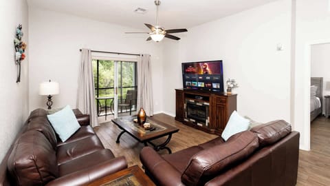 Living space with sofa sleeper and Smart TV