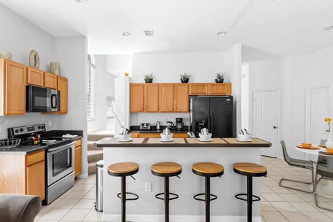 Fully Equipped Kitchen, featuring bar counter with seating for 4