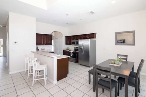 Additional seating along the counter and in the breakfast nook