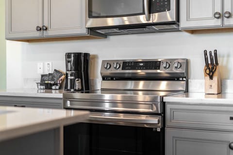 Whip up culinary delights in the modern & cozy kitchen