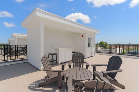 Relax and take in the sights and sounds on this rooftop deck! *views may vary by villa*