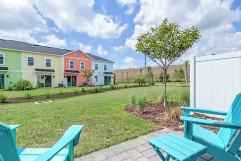 Lounge in the sunshine in the Adirondack chairs out back