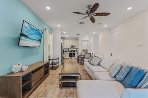 Curl up in the coastal living room & stream all your favorite entertainment