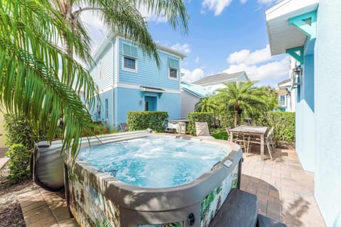 Unwind in the private hot tub, soaking away your cares in the sunshine