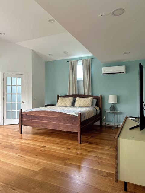 Studio apartment with hand made walnut King Bed