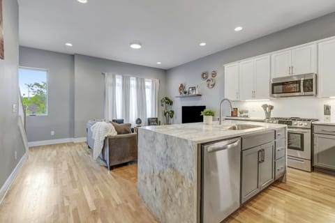 Enjoy a stylish Nashville getaway in this chic vacation rental, perfect for large groups. With a luxury kitchen and bright living space, it's the ideal base for exploring downtown and creating unforgettable memories.