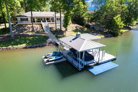 This private dock offers a peaceful retreat with breathtaking views of the lake. This is the perfect spot to watch the sunrise, cast a fishing line, or simply relax in the gentle breeze. Surrounded by natural beauty and complete privacy, it feels like you