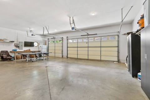 Enjoy friendly ping pong matches in the garage, or use the extra space to comfortably park your cars—versatile and convenient for your stay.