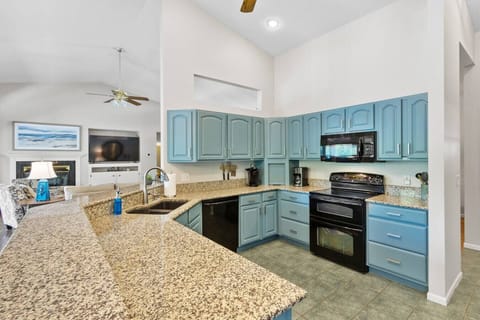 Enjoy the spacious kitchen—perfect for cooking all your meals and gathering together to share stories and laughter.