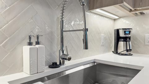 Modern kitchen with stainless steel finishes 