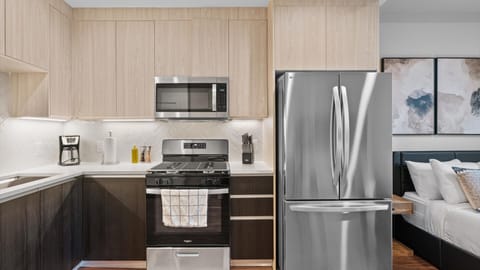 Fully equipped kitchen with silver appliances