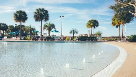 Soak up sunshine in crystal water with playful fountain sprays.