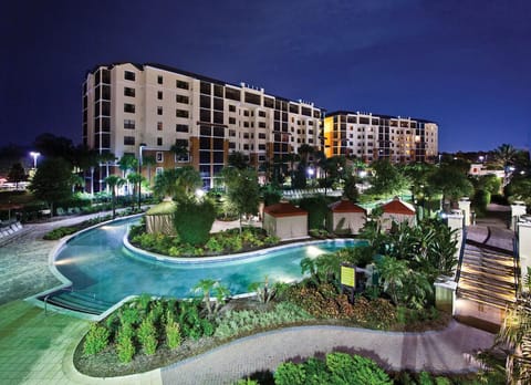 Arrive to a sparkling nightscape overlooking the lagoon-style pool.