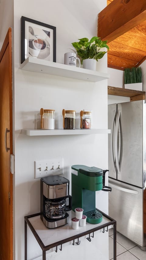 Savor a fresh cup of coffee in style at our thoughtfully designed coffee bar.