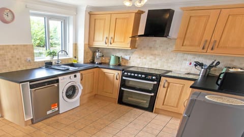 Spacious kitchen with coffee maker
